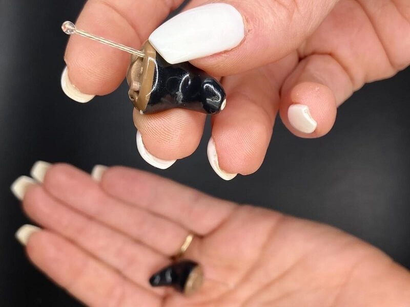 Hearing Aids in Hands